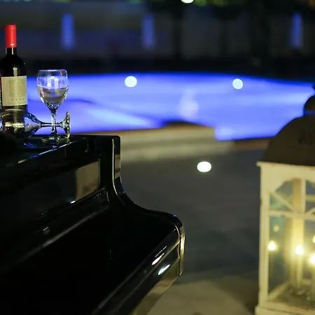 Melathron Отель